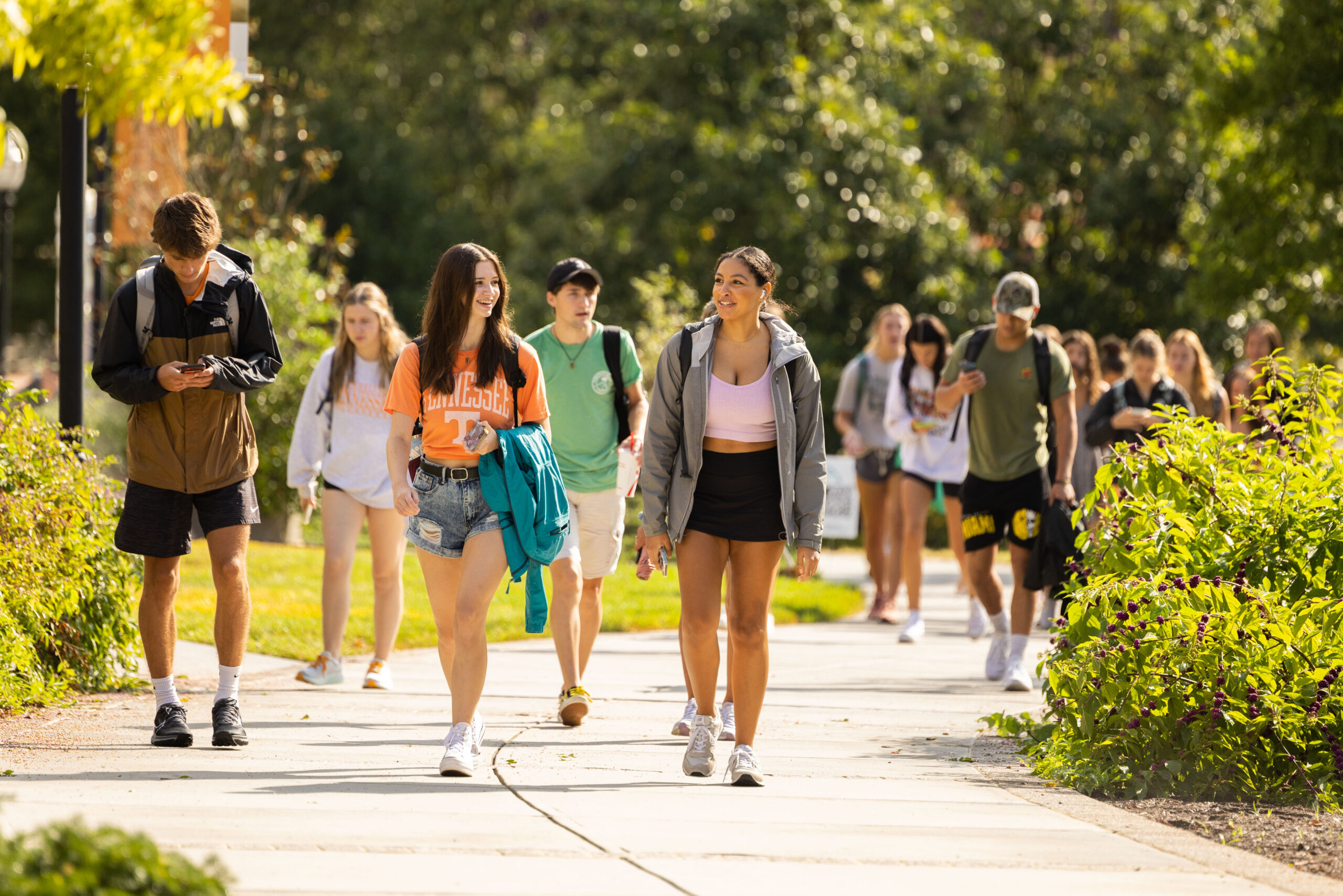 Students walk past Blueberry Falls